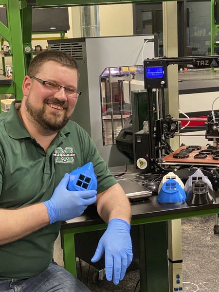 Residents use 3-D printers to make mask sets